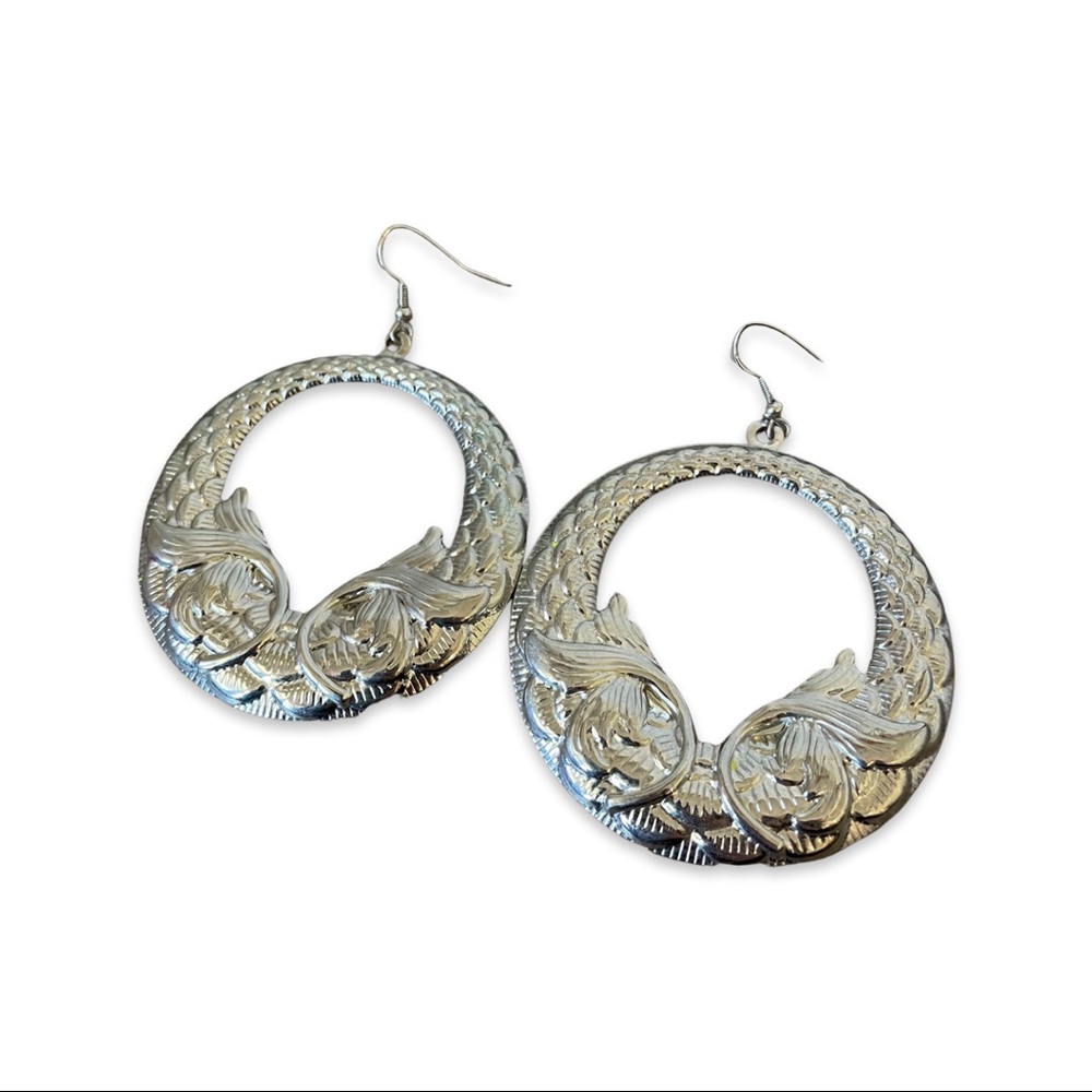 Silver colored costume earrings